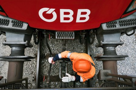 Train worker connecting freight trains