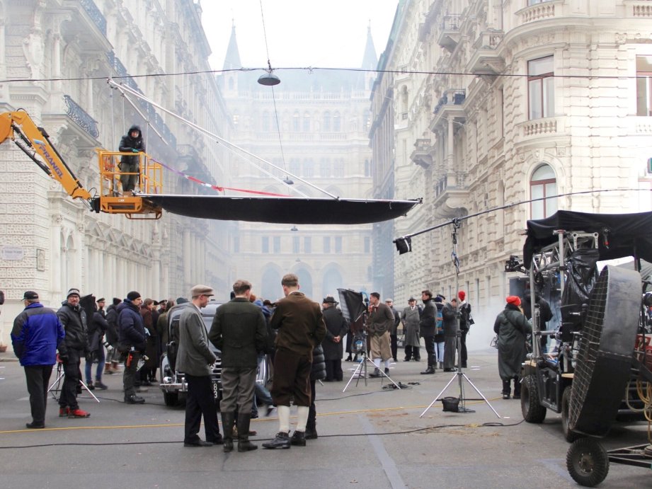 Multiple people and film equipment on a film location